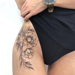 Tatouage Femme Cuisse